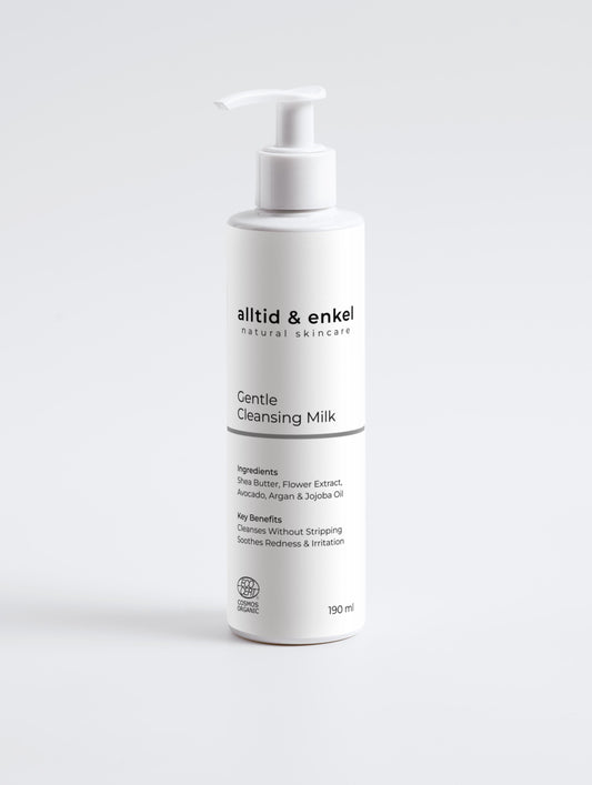 Gentle cleansing milk in a sleek white bottle on a white background, 190 ml.