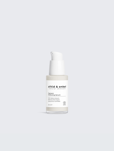 Pigment perfecting serum in a sleek white bottle on a white background, 30 ml.