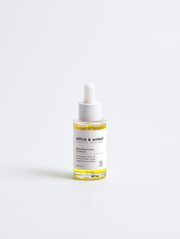 Bakuchiol oil serum in a sleek white bottle on a white background, 30 ml.