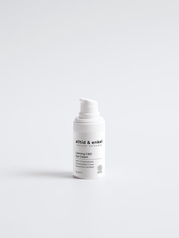 CBD calming eye cream in a sleek white bottle on a white background, 15 ml.