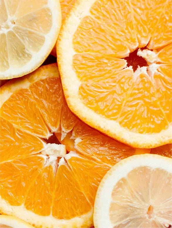 Close-up of sliced oranges and lemons with a bright and vibrant color.