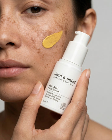 Woman holding Kojic Acid Face Serum by alltid & enkel