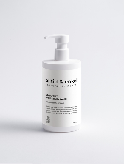 Grapefruit hand and body wash in a sleek white bottle on a white background, 400 ml.