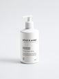 Moisturising conditioner in a sleek white bottle on a white background, 290 ml.