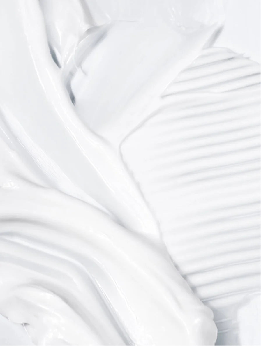 Close-up of silky skin serum texture.