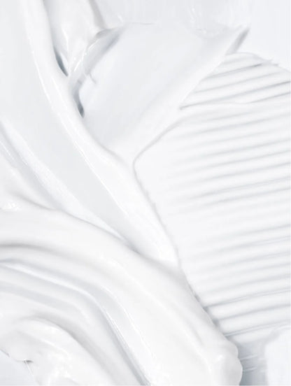 Close-up of silky skin serum texture.