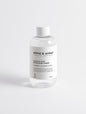 Glycolic acid face toner in a sleek white bottle on a white background, 290 ml.
