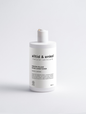 Keratin volume boost conditioner in a sleek white bottle on a white background, 390 ml.