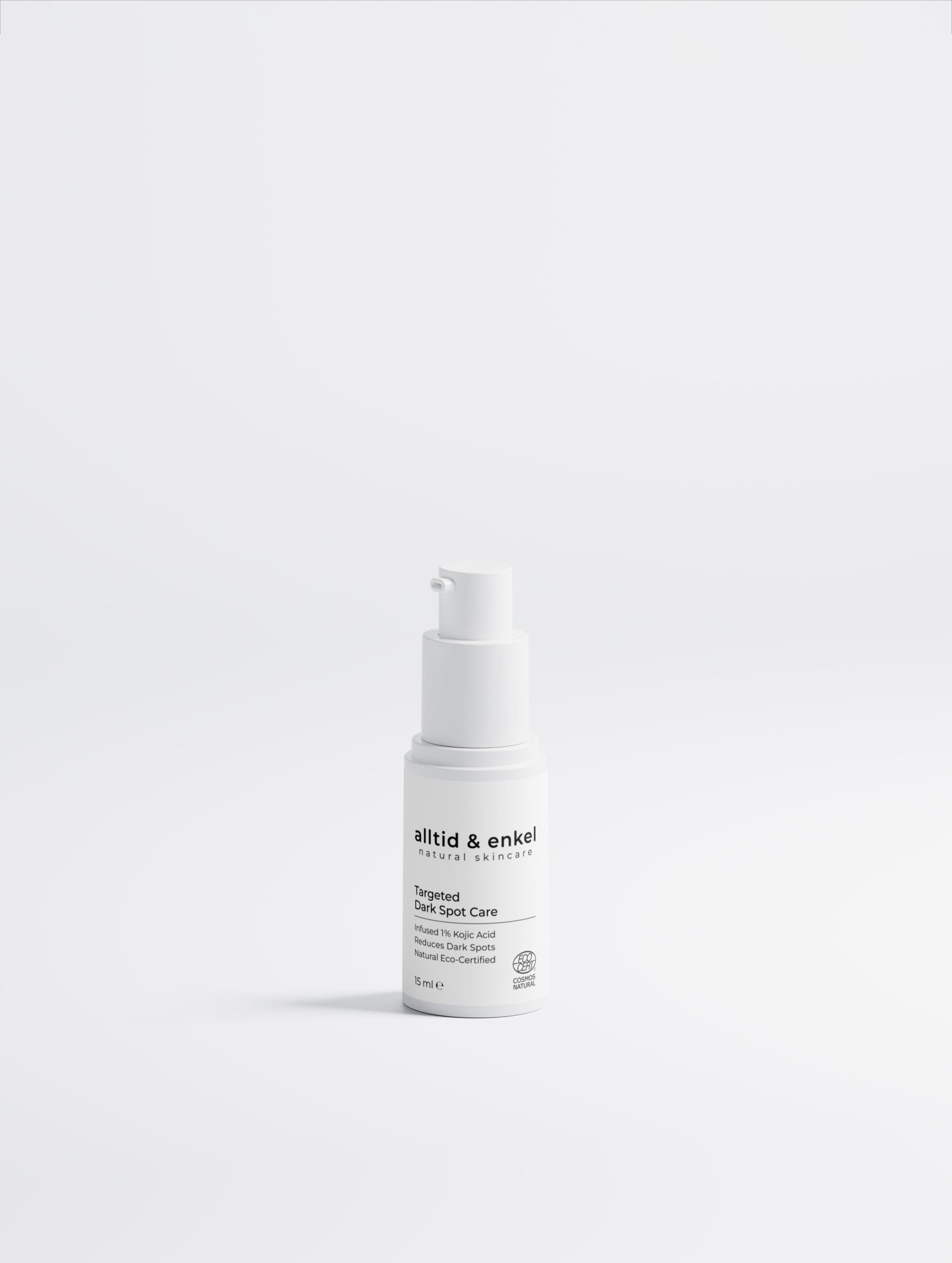 Dark spot kojic acid serum in a sleek white bottle on a white background, 15 ml.