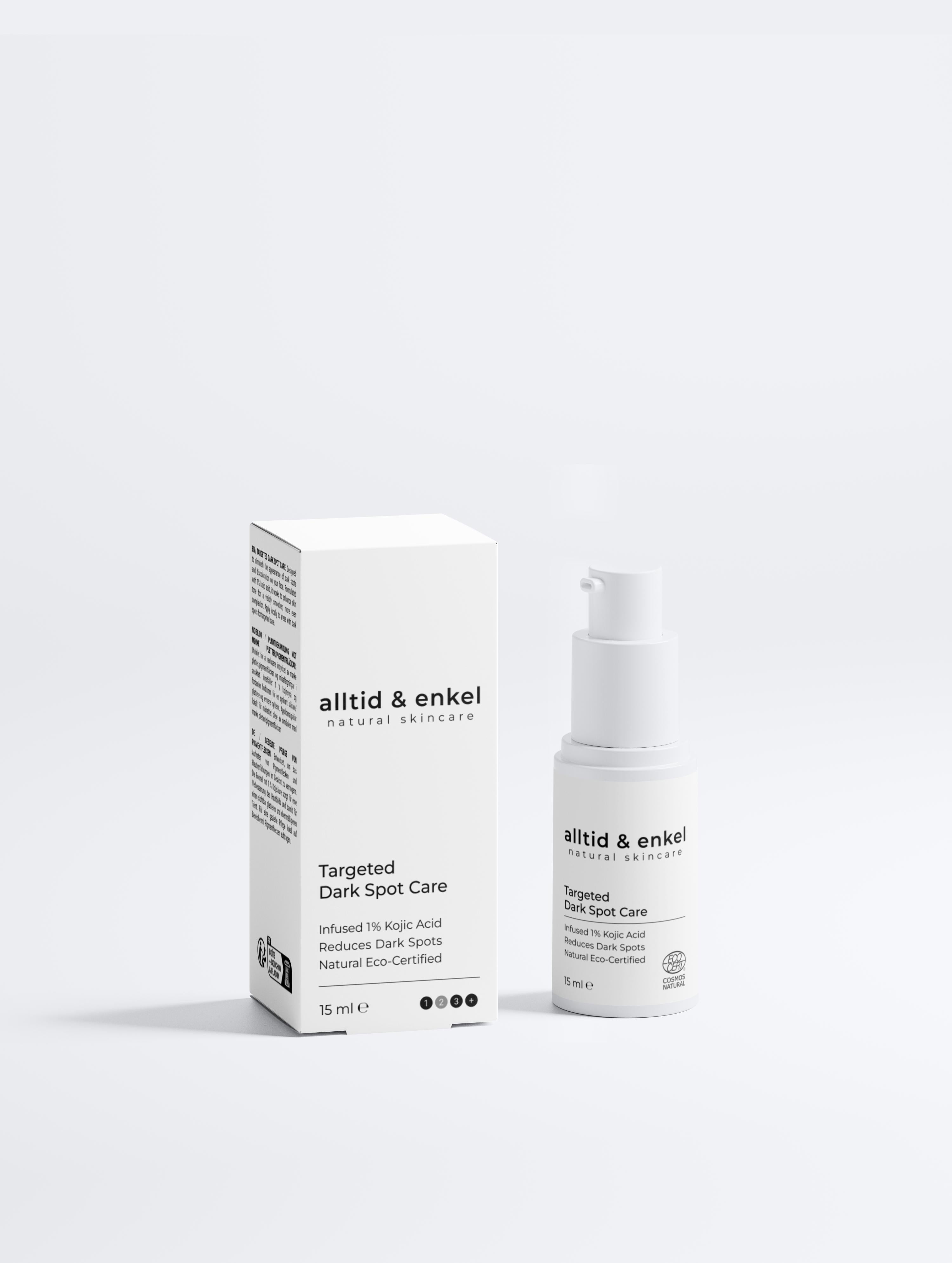 Dark spot kojic acid serum in a sleek white bottle with box on a white background, 15 ml.