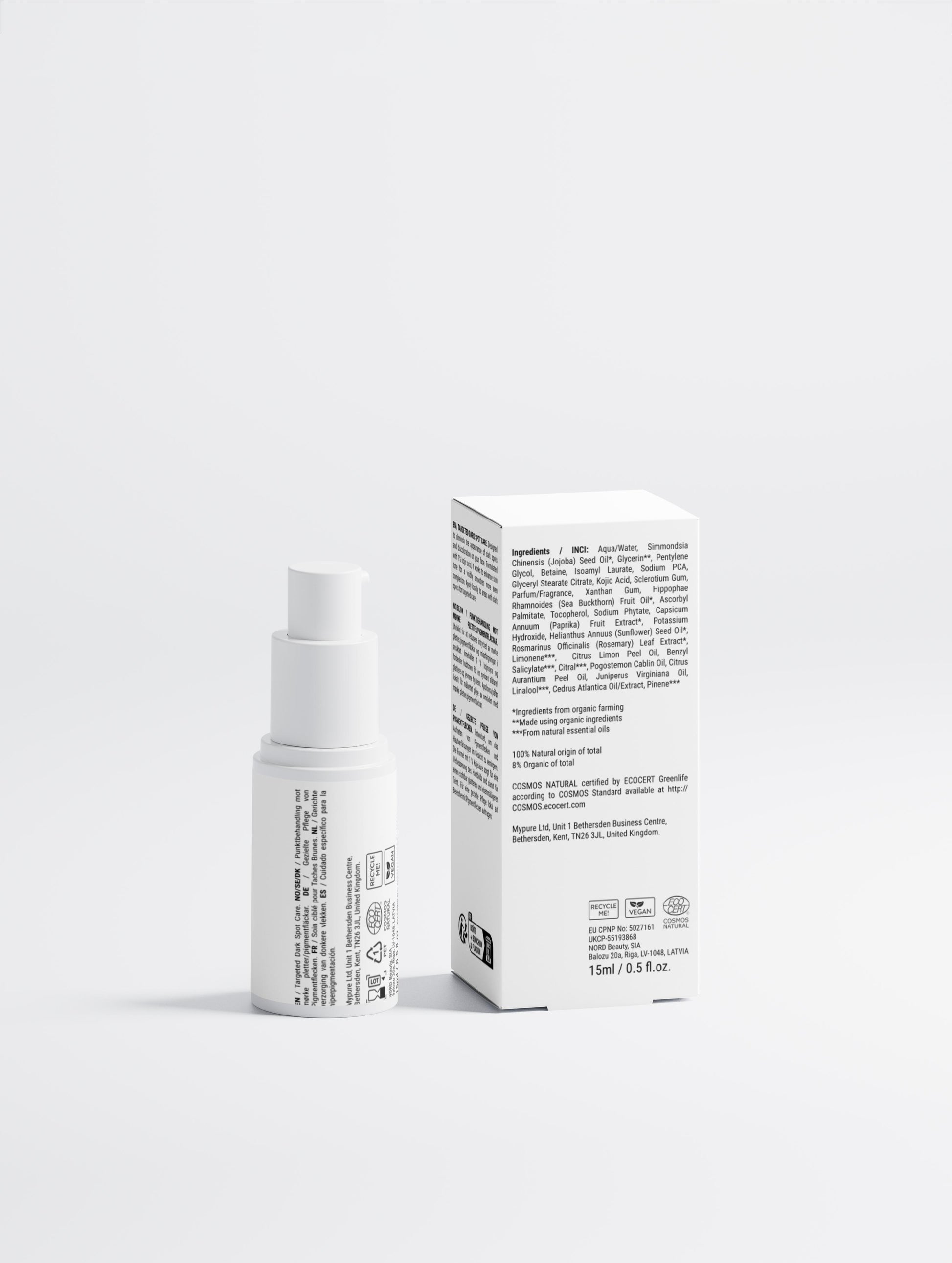 Dark spot kojic acid serum in a sleek white bottle on a white background, 15 ml.