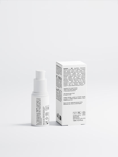 Dark spot kojic acid serum in a sleek white bottle on a white background, 15 ml.