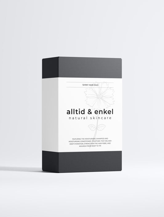 Box of moisturising shampoo and conditioner collection on a white background from the front side.