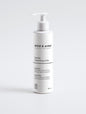 Gentle cleansing milk in a sleek white bottle on a white background, 190 ml.