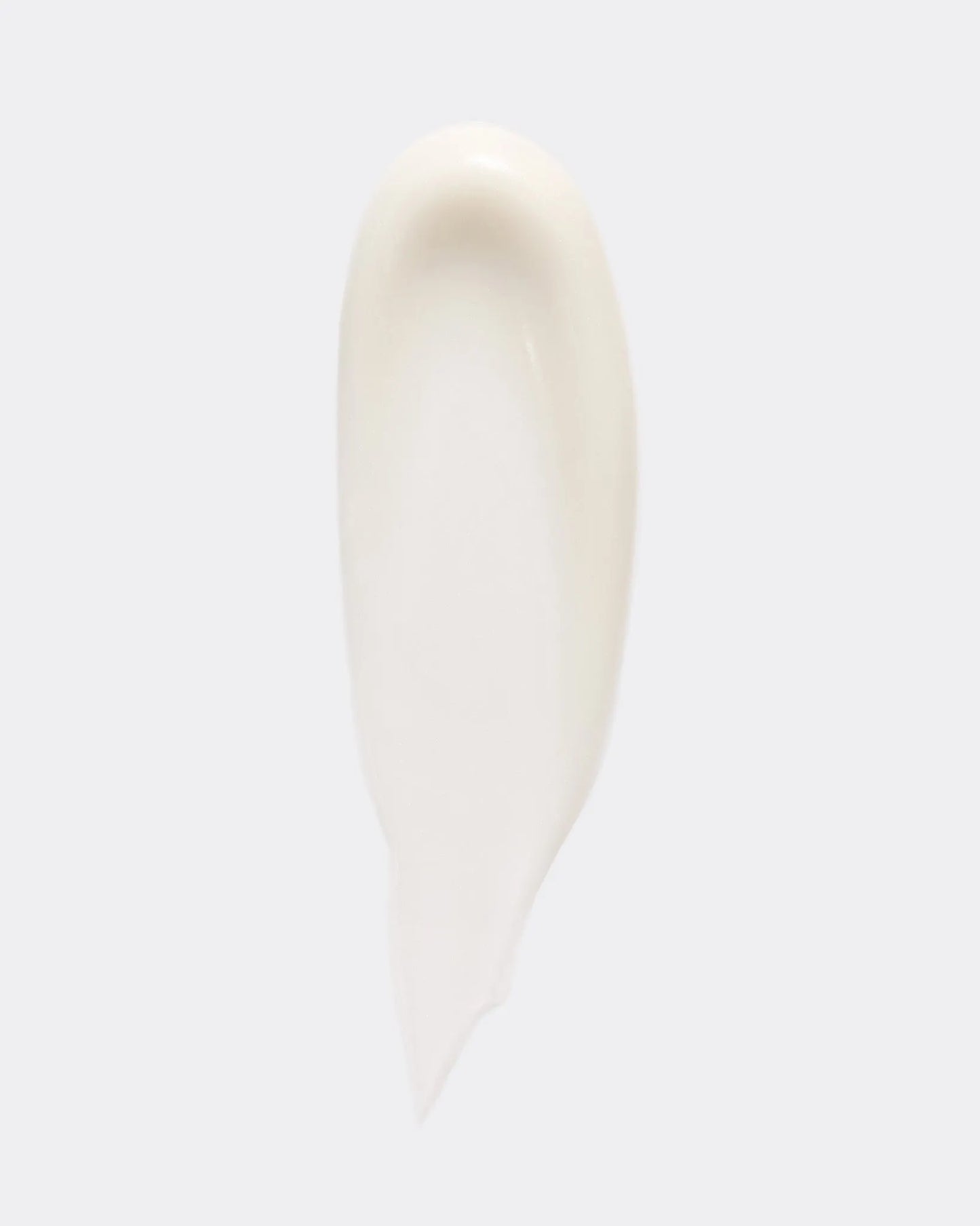 Close-up of moisturising day cream texture on a white background.
