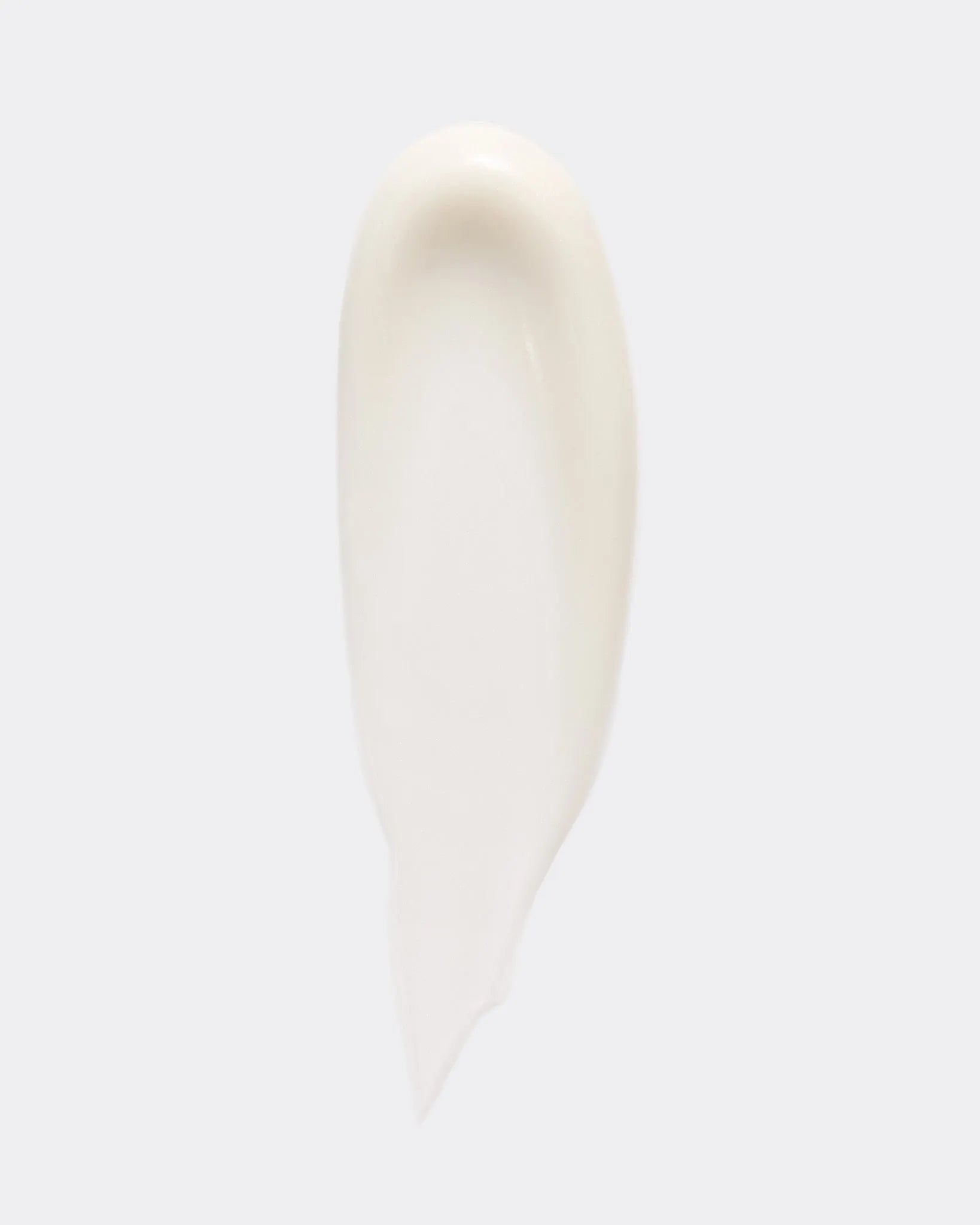 Close-up of moisturising day cream texture on a white background.