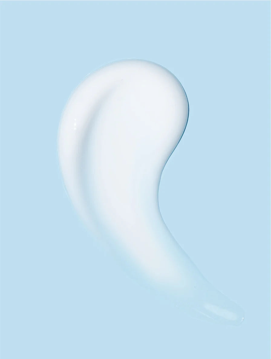 Close-up of anti-aging day cream texture on a white background.