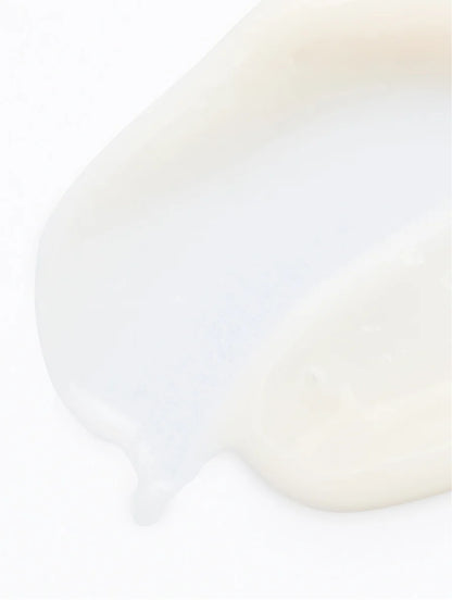 Close-up of pigment perfecting serum texture on a white background.
