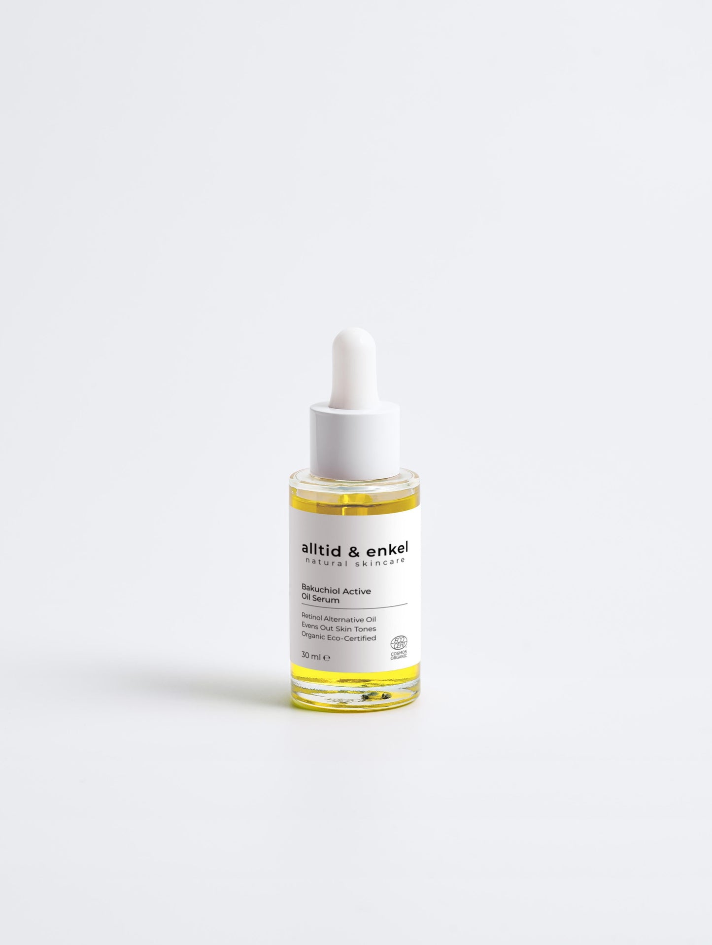 Bakuchiol oil serum in a sleek white bottle on a white background, 30 ml.