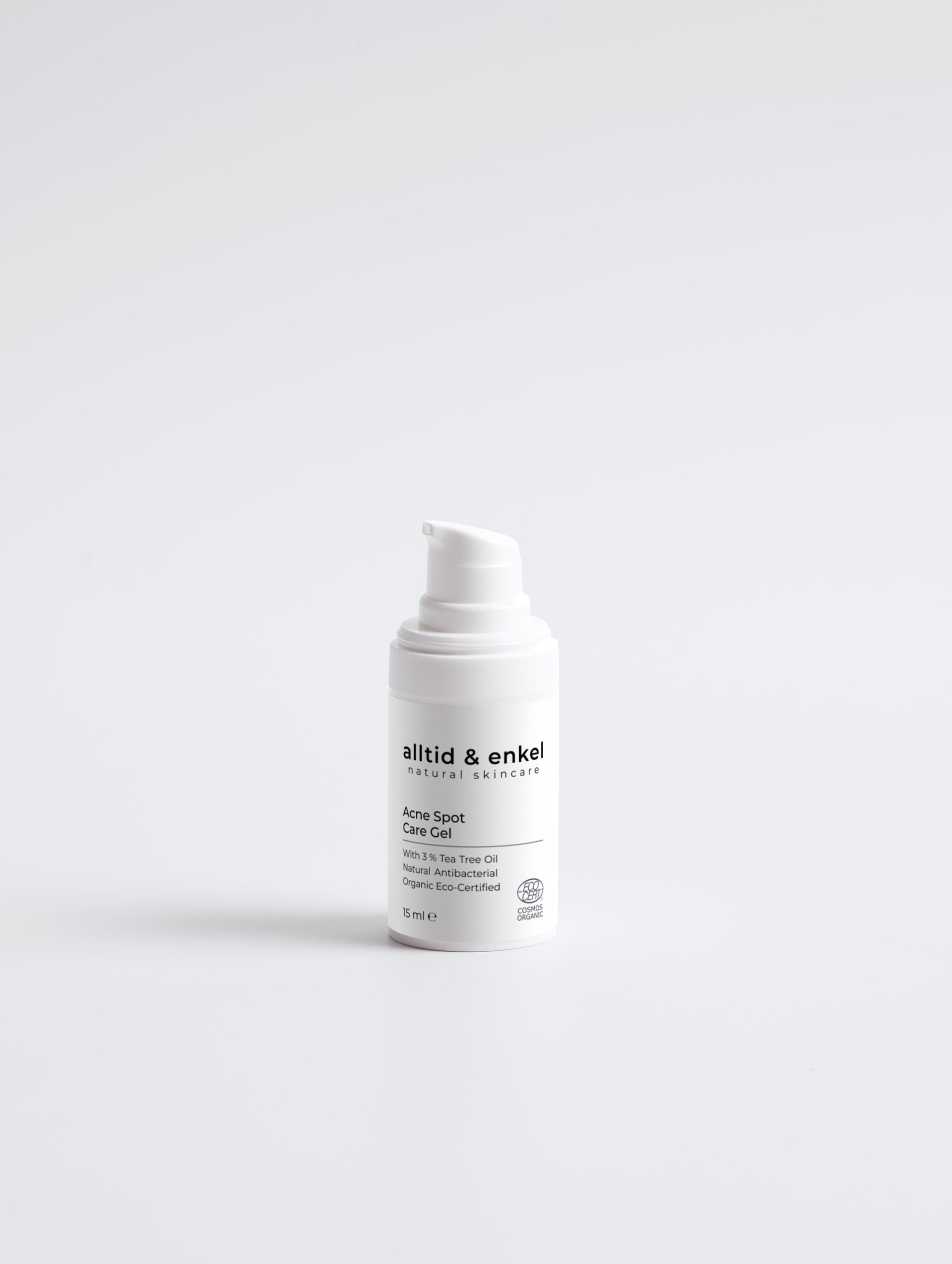 Acne spot care gel in a sleek white bottle on a white background, 15 ml.