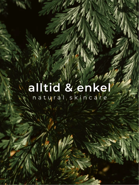 Skincare brand name on a background of green leaves