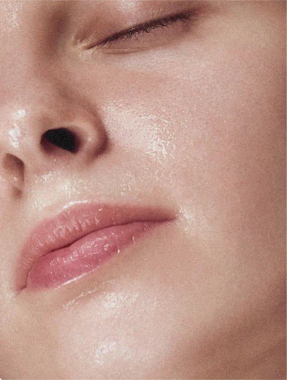 Close-up of a person's face with a focus on the skin texture around the nose and lips.