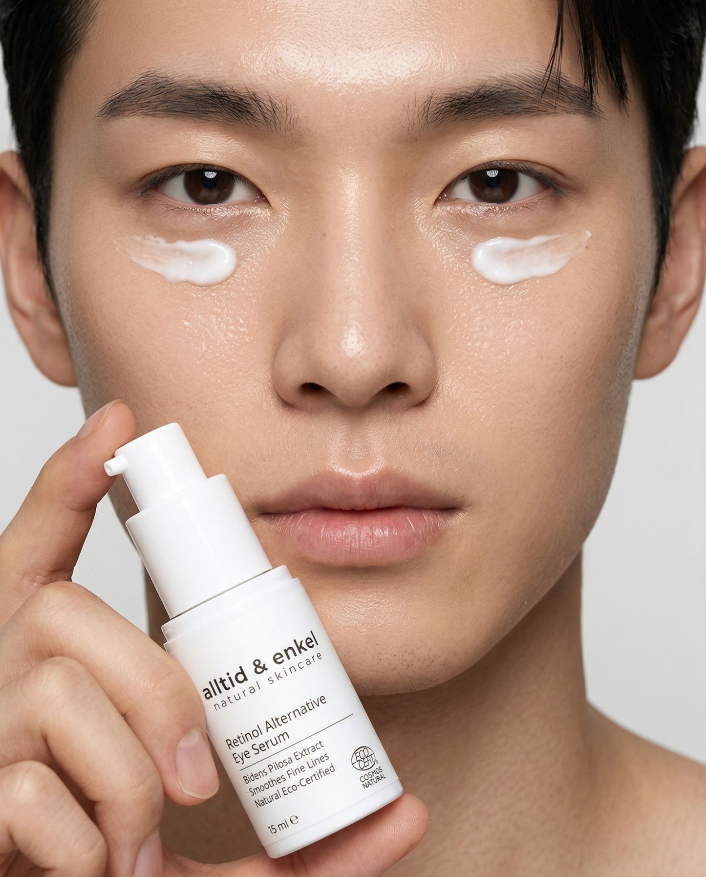 Man holding Retinol Alternative Eye Serum by alltid & enkel